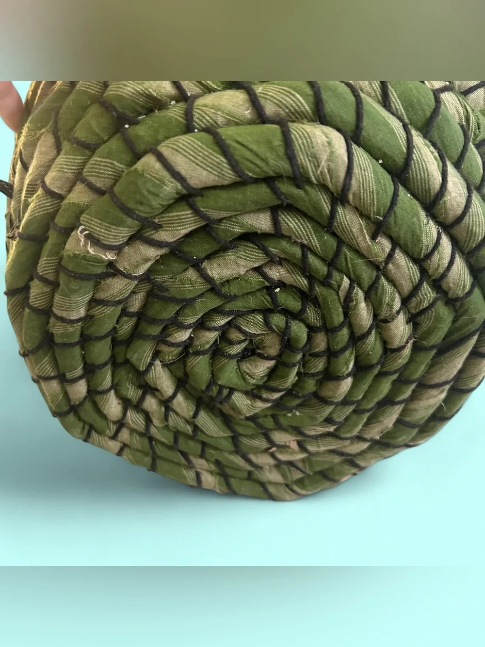Handmade woven cloth covered basket
